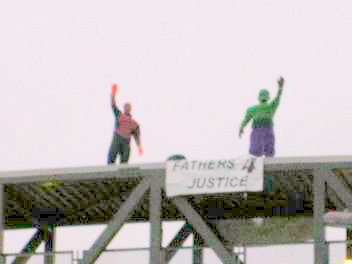 Spiderman and  the  Incredible Hulk  at  the Sapperton	Skytrain
	   station, Vancouver British Columbia