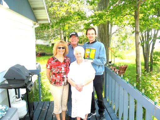 John Dunn with grandmother, aunt and father