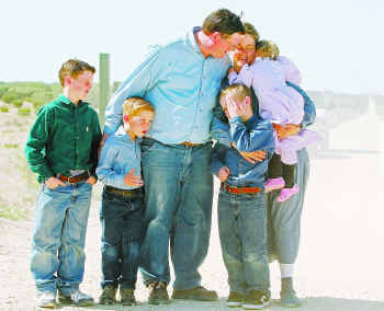 Edson Jessop and wife Zavenda Young with children