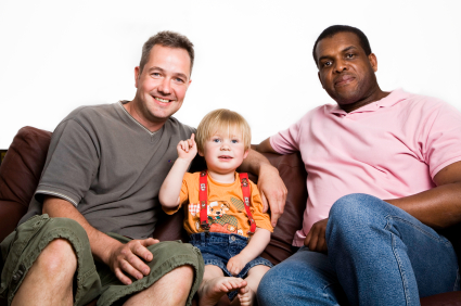 gay couple with child, from Out & About newspaper