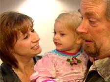 AnneMarie and Doug  Stuth with granddaughter Alexis