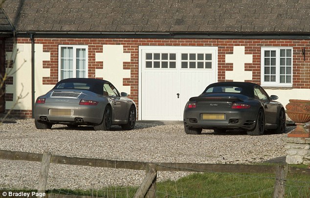 Porsches outside home of George Hibbert