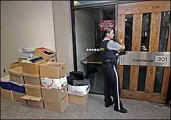 Sheriff beside documents