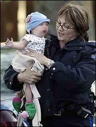 Police carry Mona-Clare