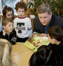 Stephen Harper reads to children at Copper House