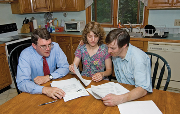 Neil and Heidi Howard with Gregory Hession