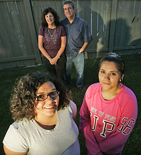 Alice and Nick Zizzo and adopted daughters Stephanie
		  Cassondra.