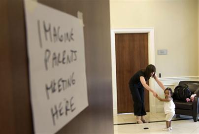 Kathy McGuire with adopted daughter Kya