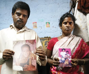 Nageshwar Rao and Sivagama with photo of Subash