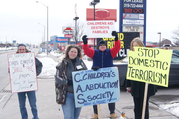 rally outside riding office of Gerry Martiniuk