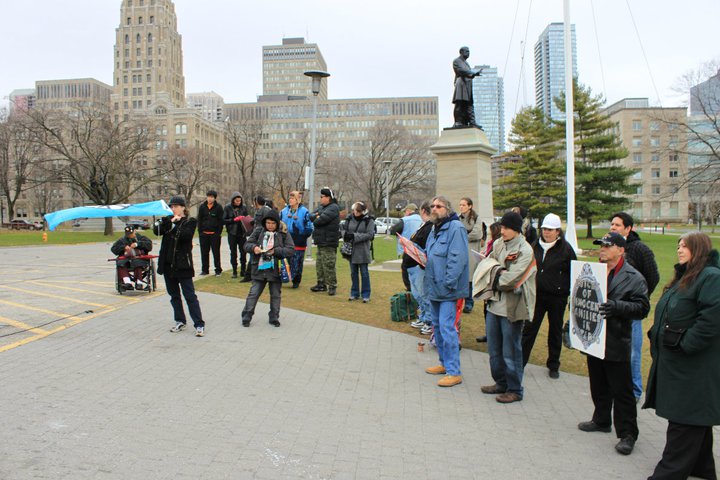 rally crowd facing Legislature