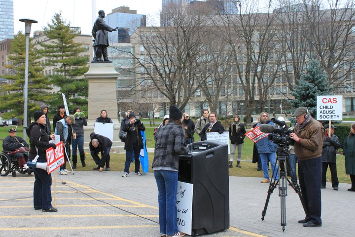 Rally crowd listening to Rose Whyte-Bray