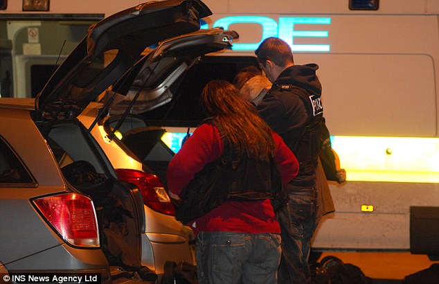 Officers load up their cars