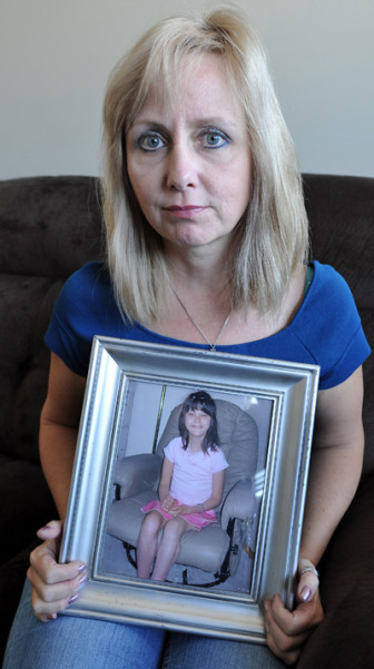 Velvet Martin with picture of daughter Samantha Martin