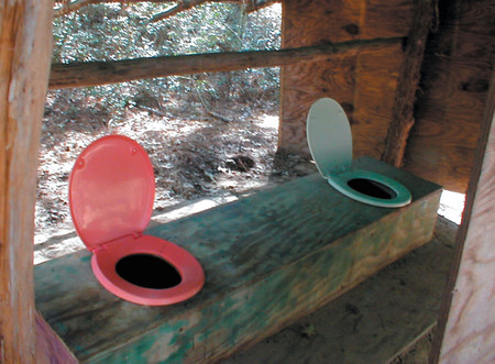 Makeshift outhouse at a therapeutic campsite